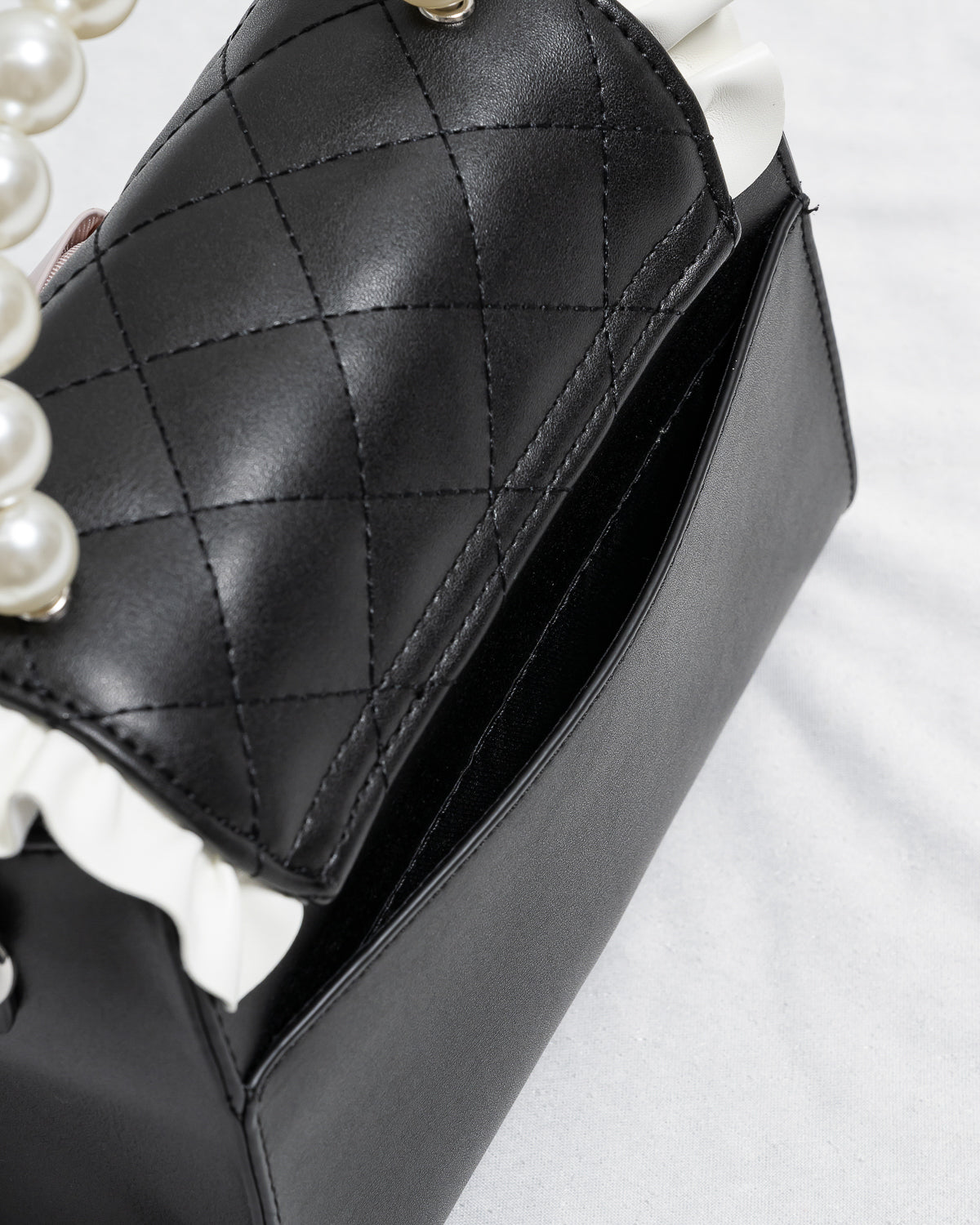 フロントリボンキルティングフラップバッグ