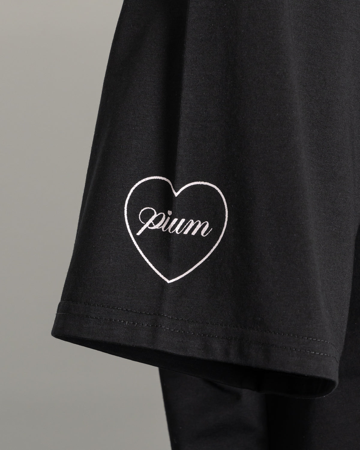 リボンクロスラメプリントオーバーサイズTシャツ