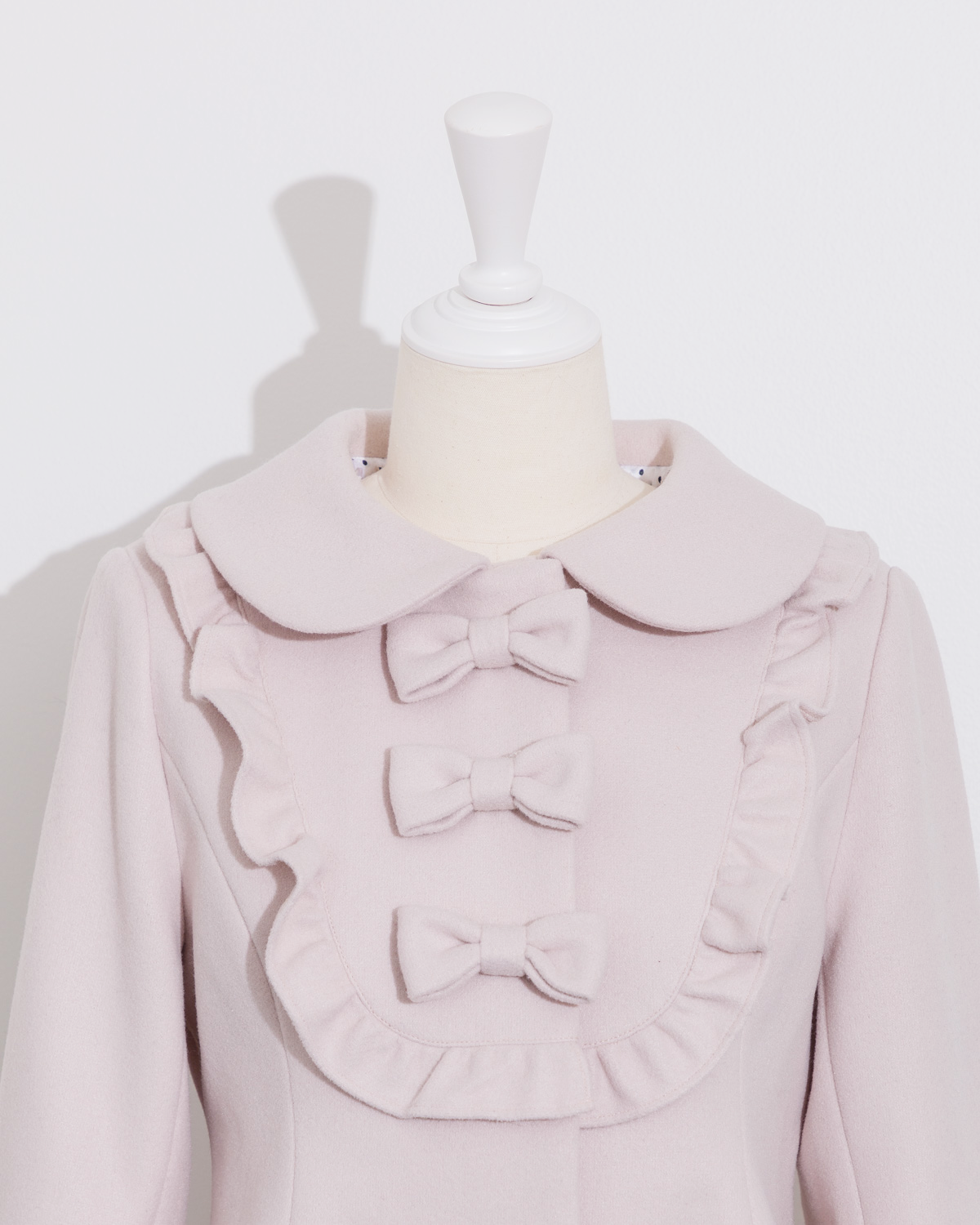 ヨークフリルリボンドーリーコート