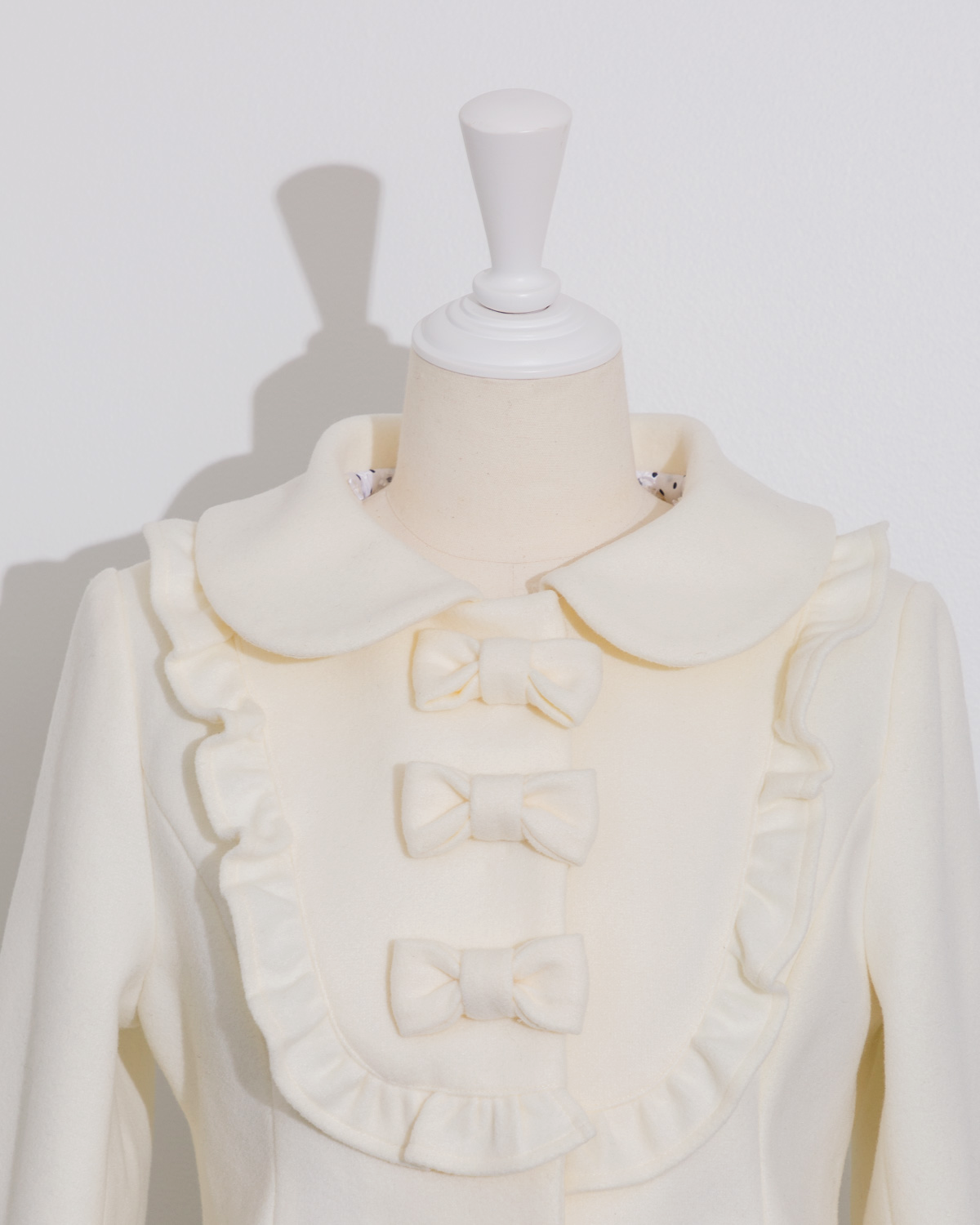 ヨークフリルリボンドーリーコート