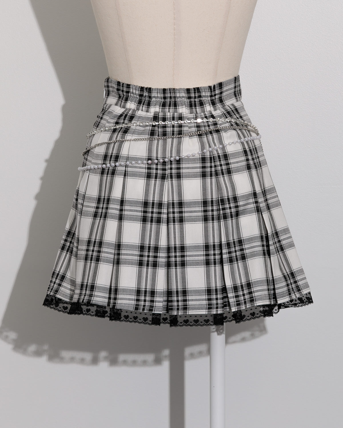 ビジューチェーン付きチェックプリーツスカパン