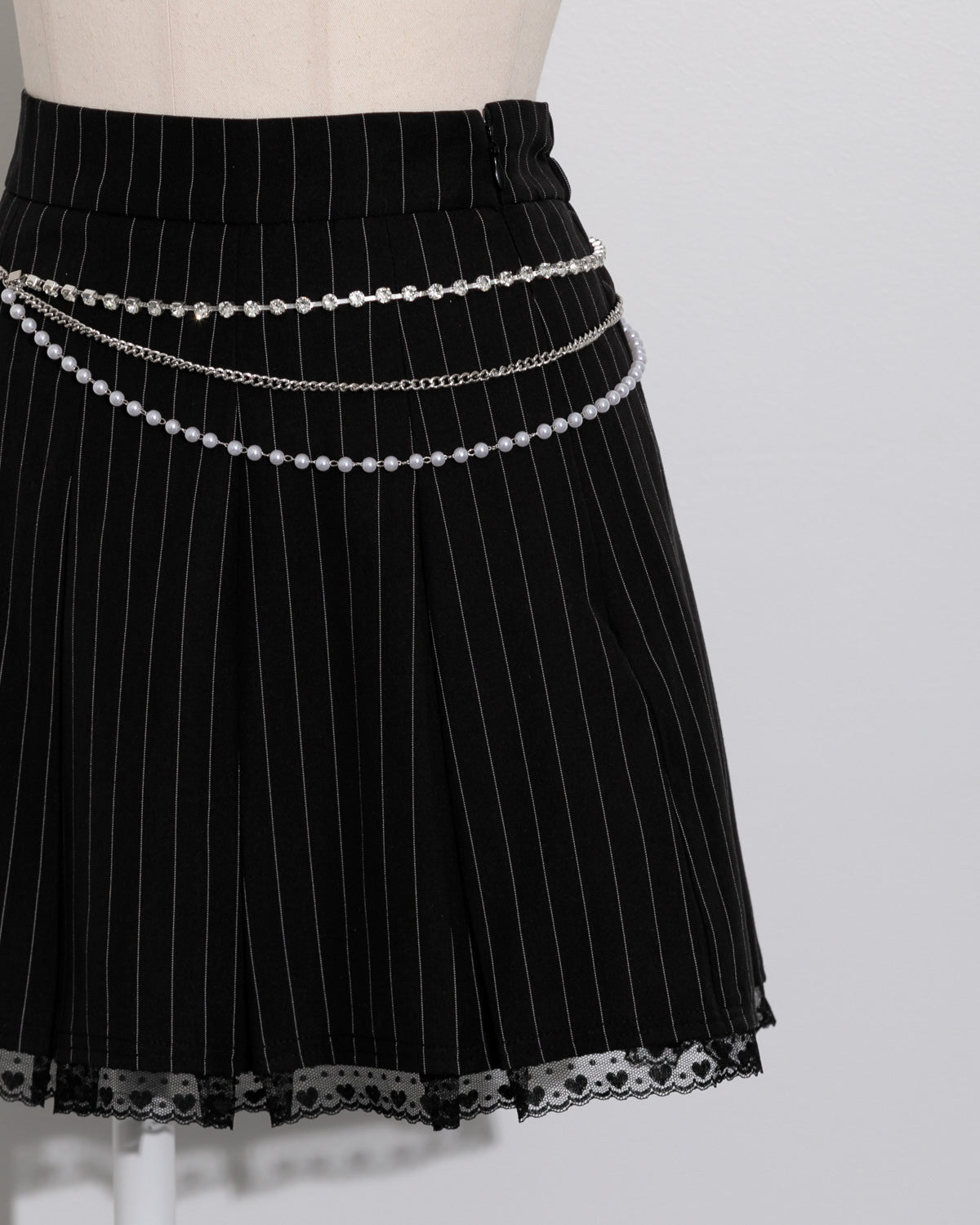 ビジューチェーン付きチェックプリーツスカパン