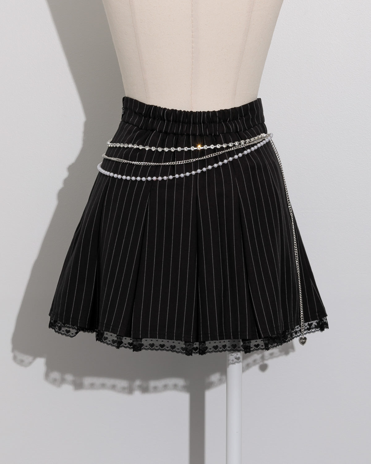 ビジューチェーン付きチェックプリーツスカパン