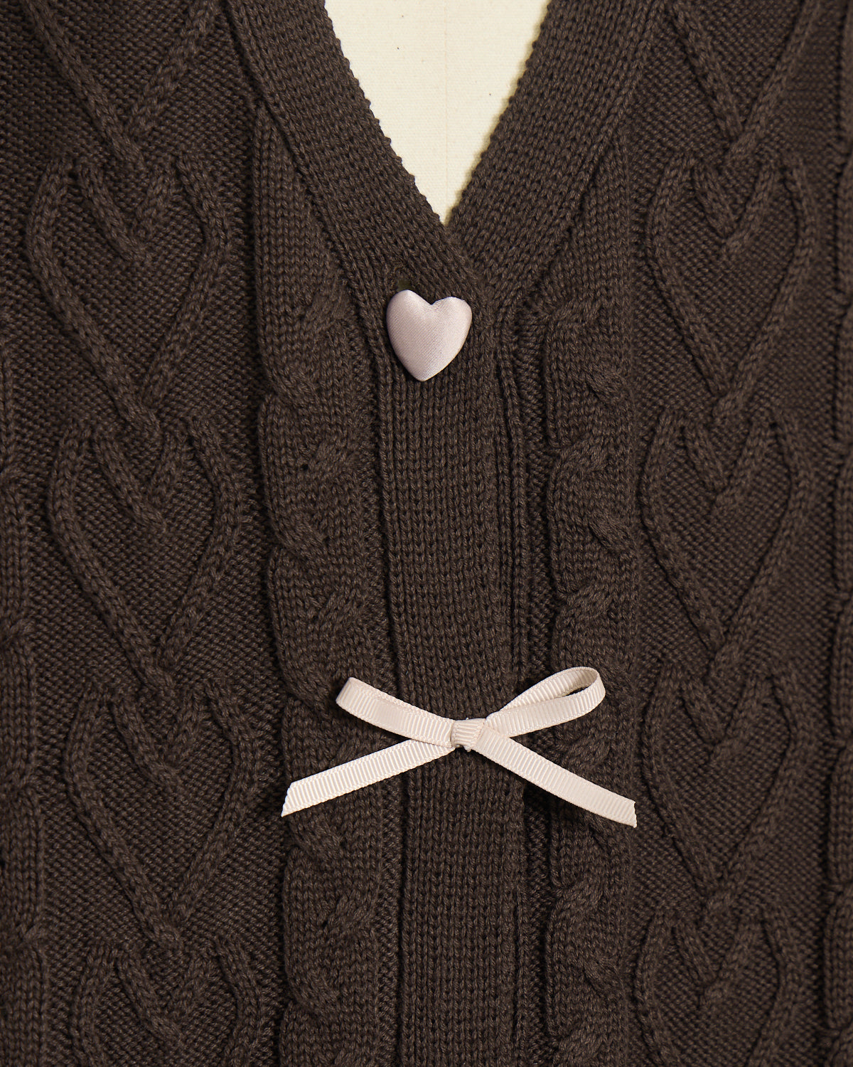 ハートボタンケーブルロングカーデ