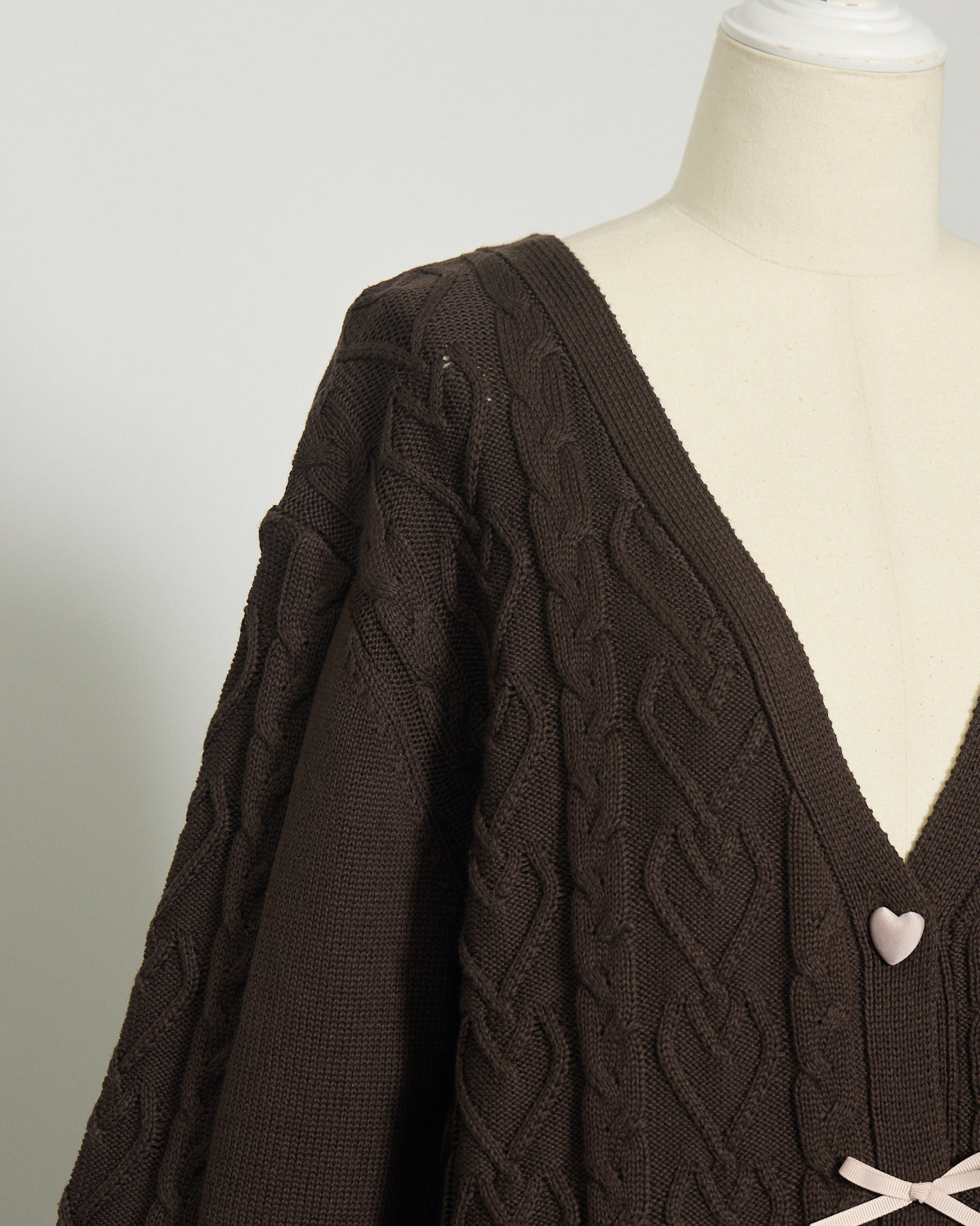ハートボタンケーブルロングカーデ