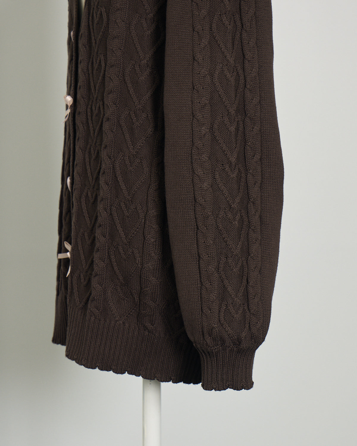 ハートボタンケーブルロングカーデ