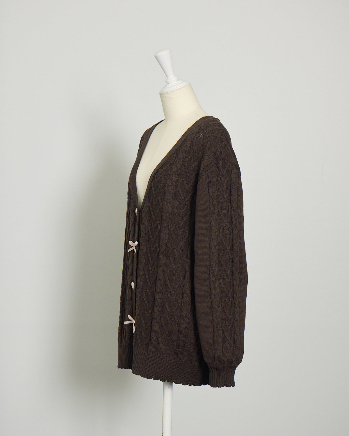 ハートボタンケーブルロングカーデ