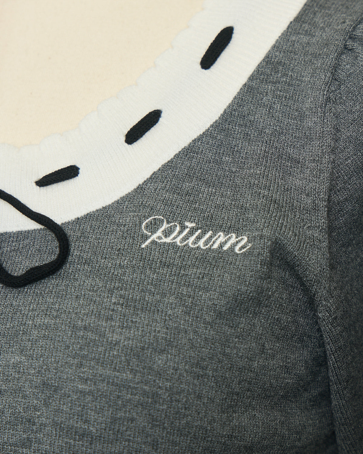 アームウォーマー付きバイカラーリボンニット