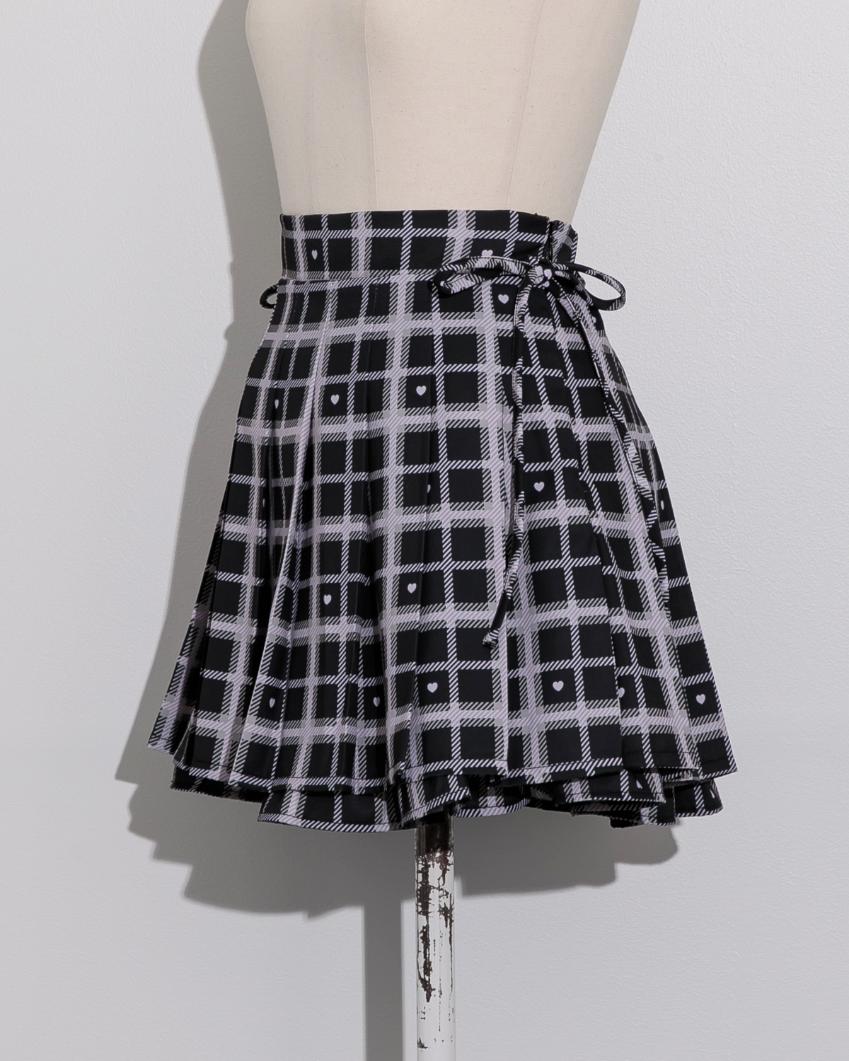 piumハートチェックサイドリボンプリーツスカート