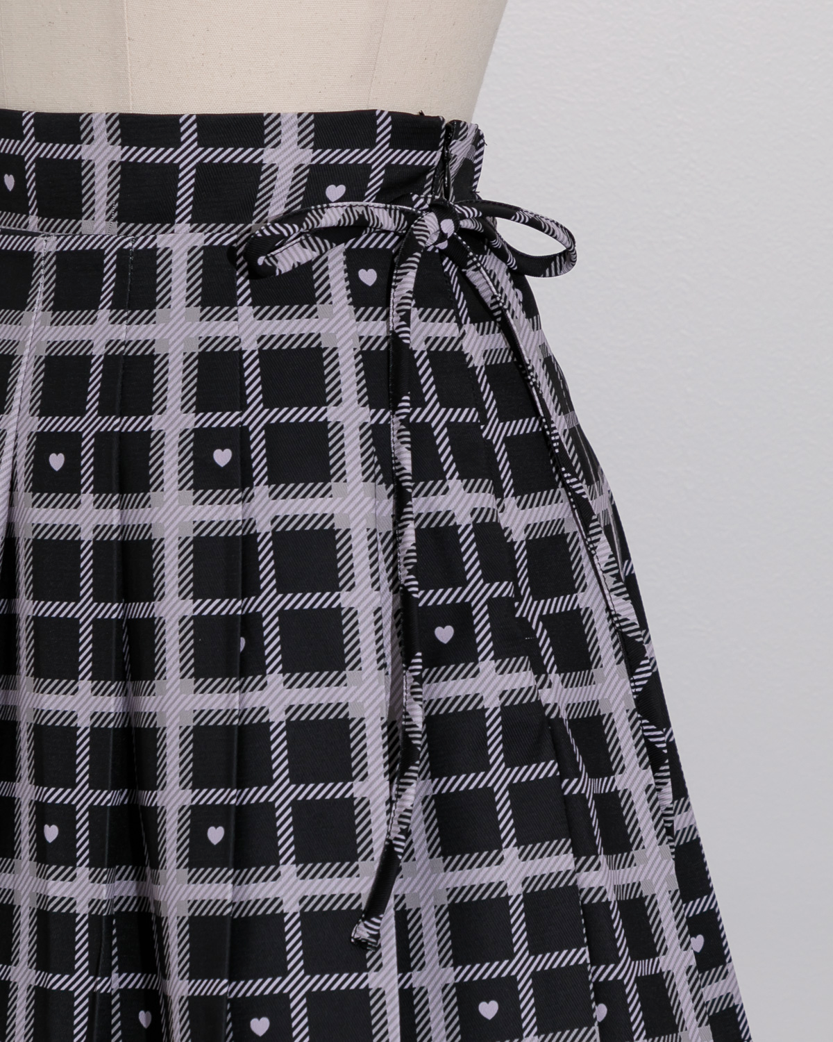 piumハートチェックサイドリボンプリーツスカート