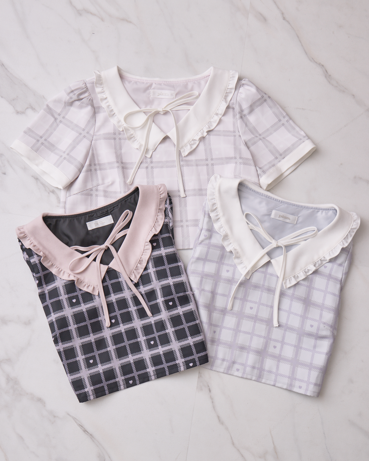 piumハートチェックフリルカラートップス