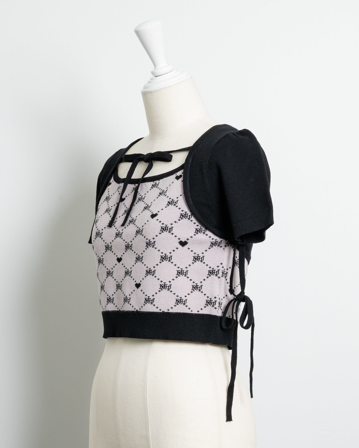 ケープレイヤードモノグラムニット