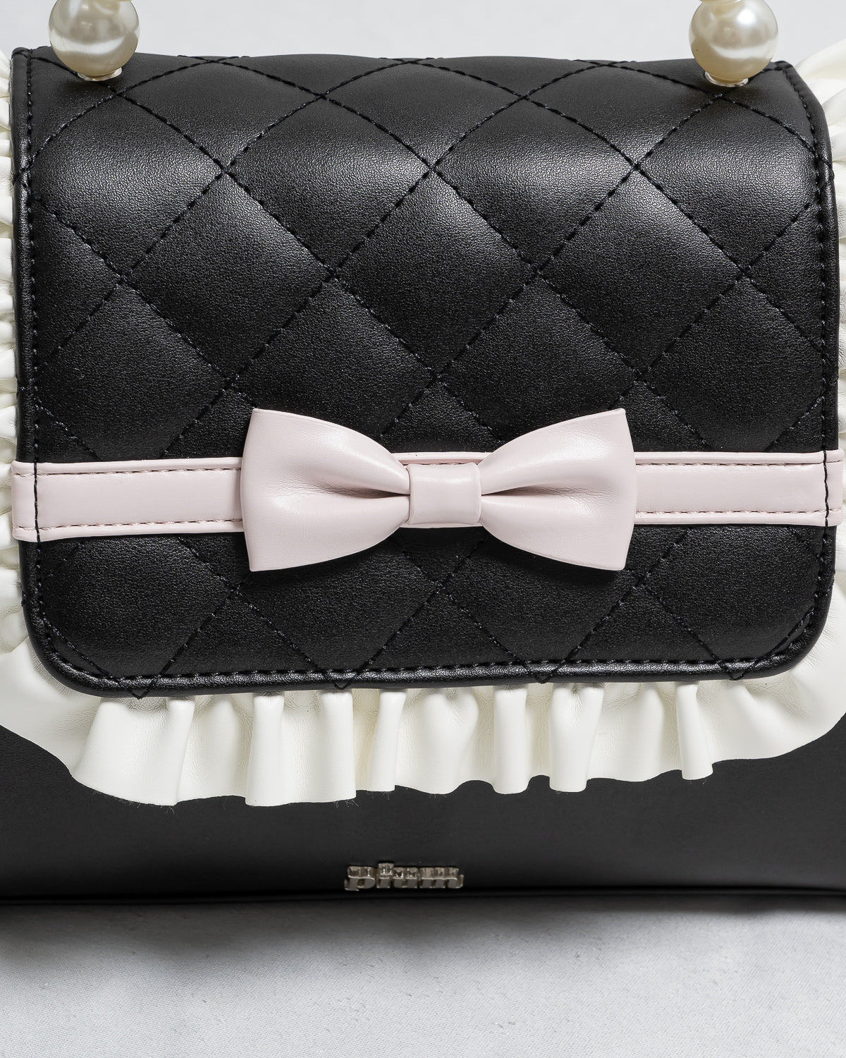 フロントリボンキルティングフラップバッグ