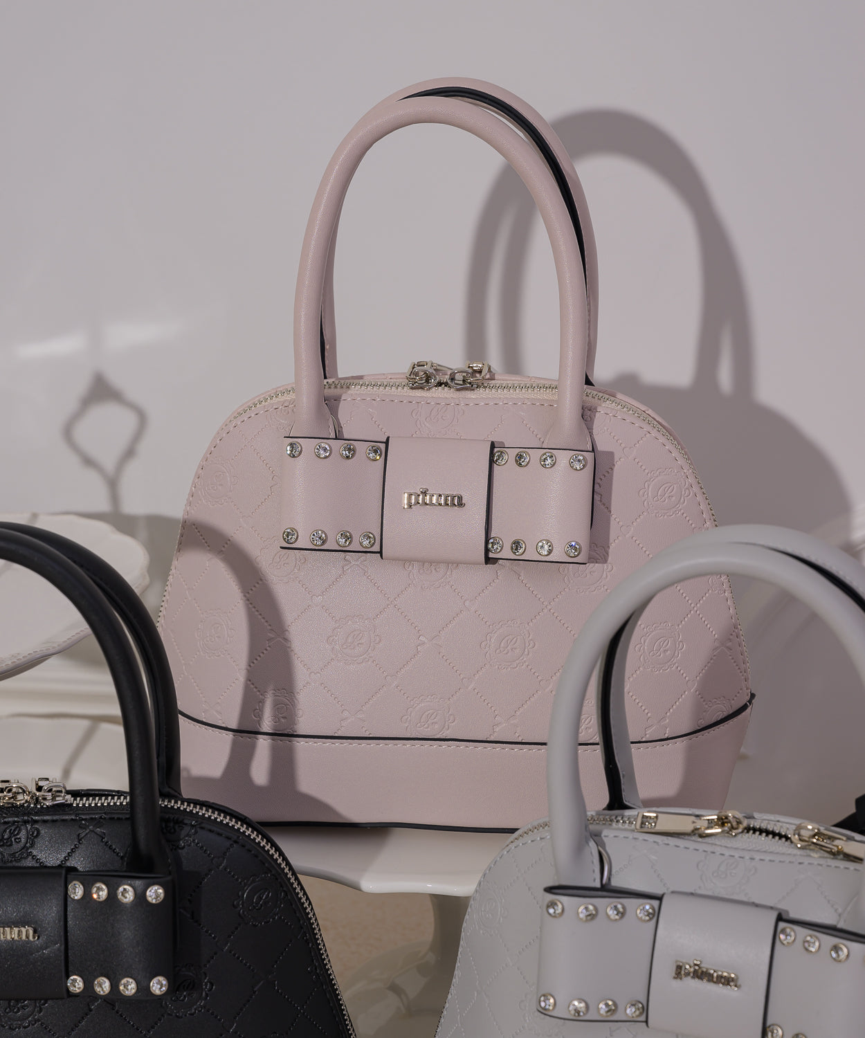 ビジューリボンモノグラムバッグ