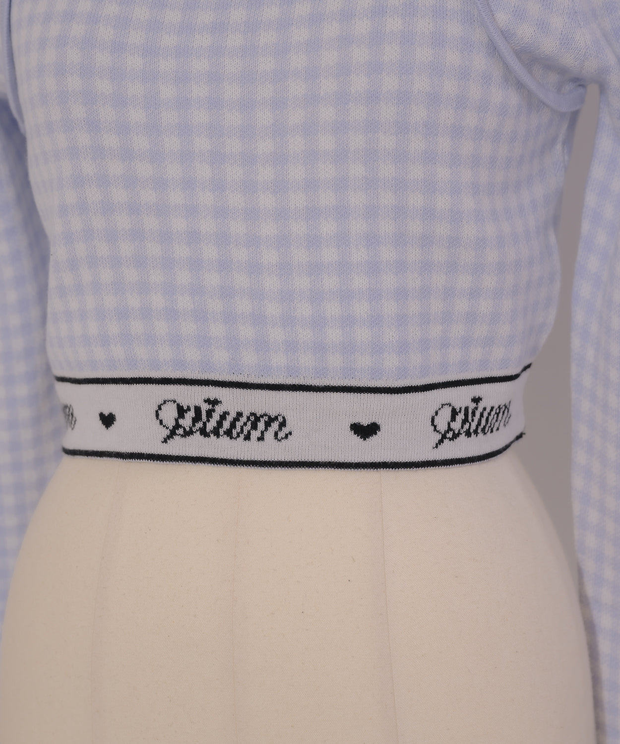 piumロゴラインリボンテープ長袖ニット