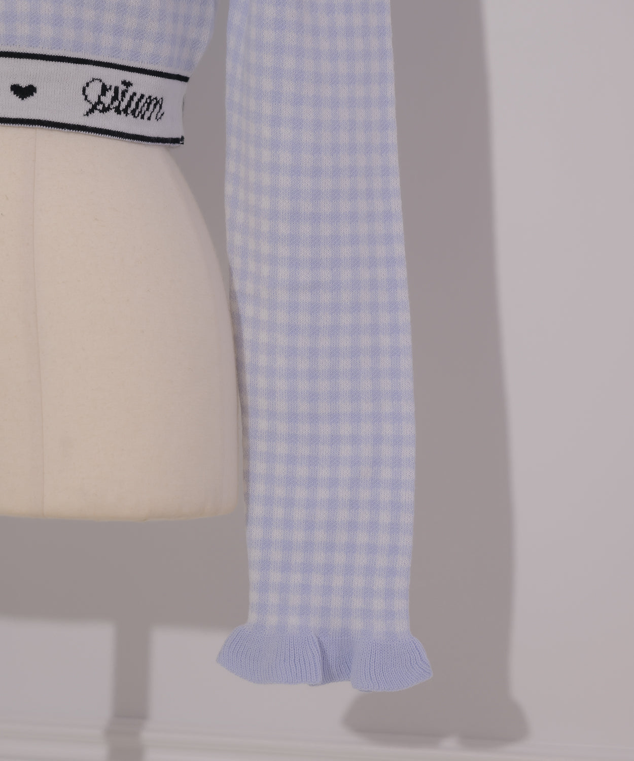 piumロゴラインリボンテープ長袖ニット