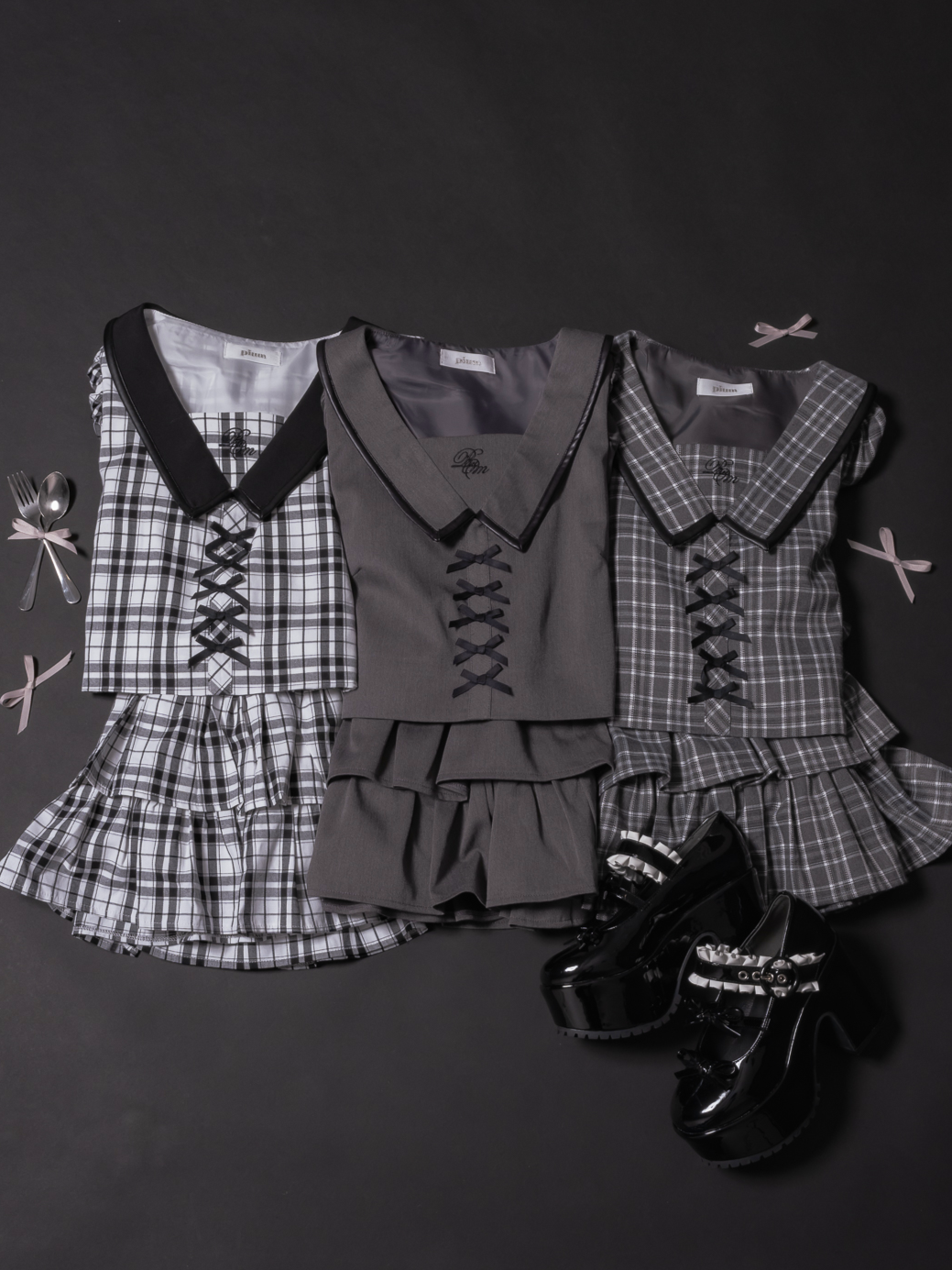 レザーパイピングフロントリボントップス