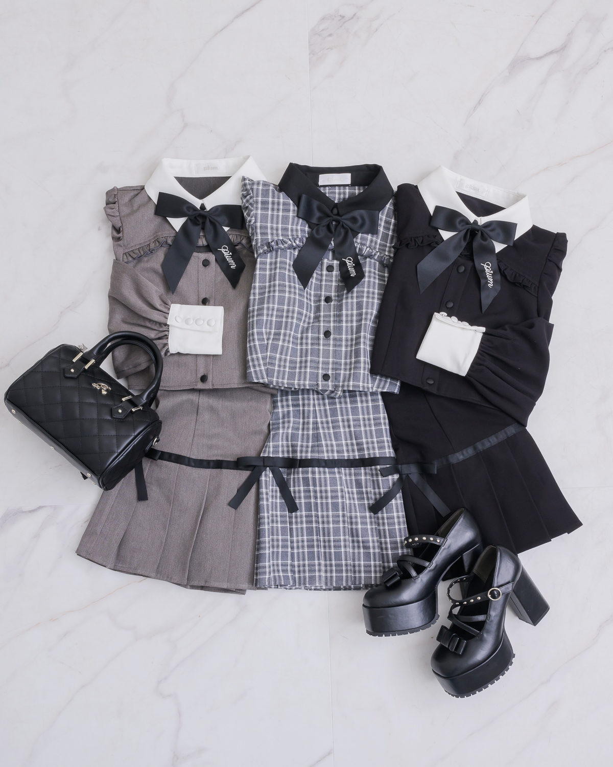 カットアウトリボンブローチ付きトップス