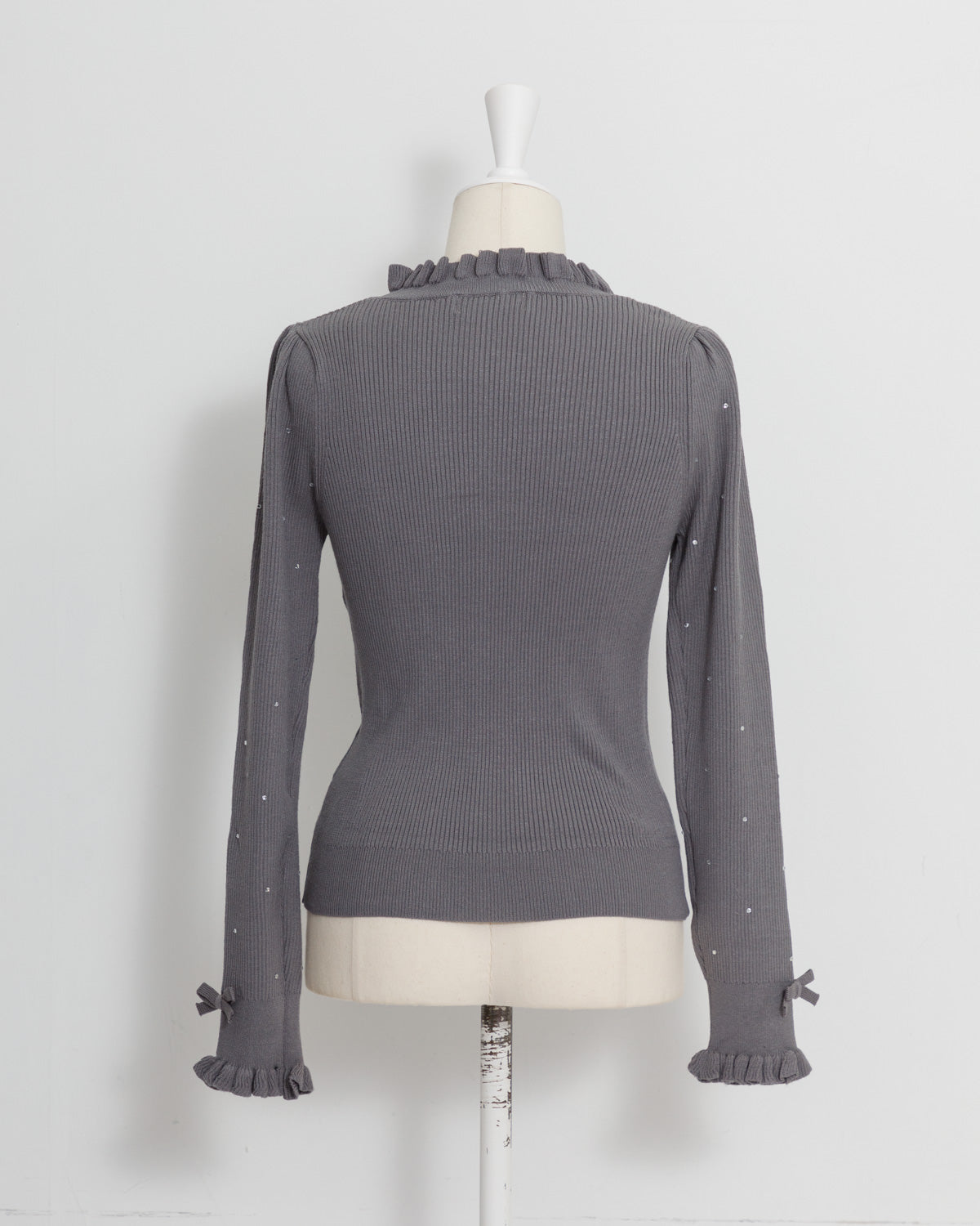 フリルハイネックビジューリブニット