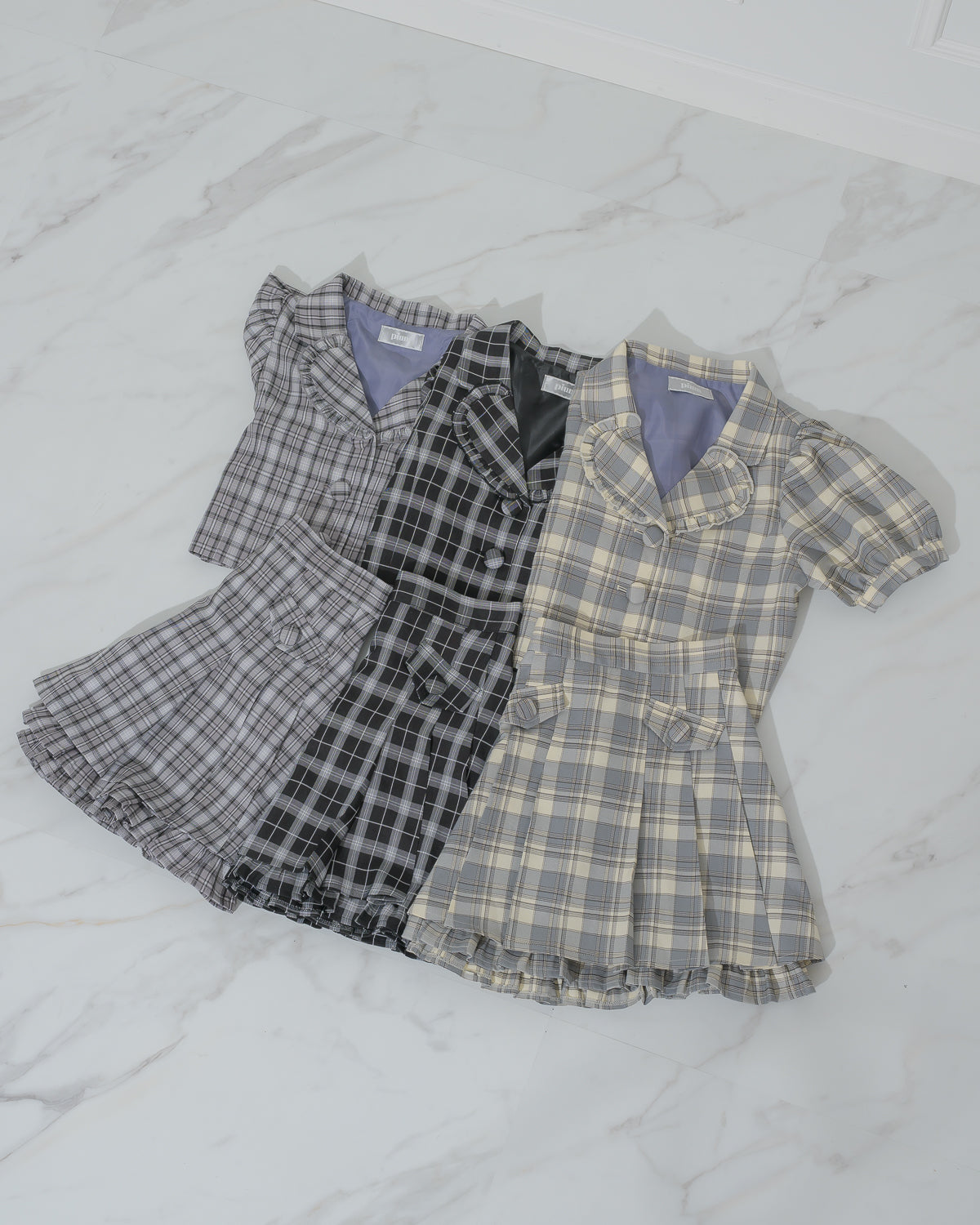 プリーツフリルチェックミニスカート