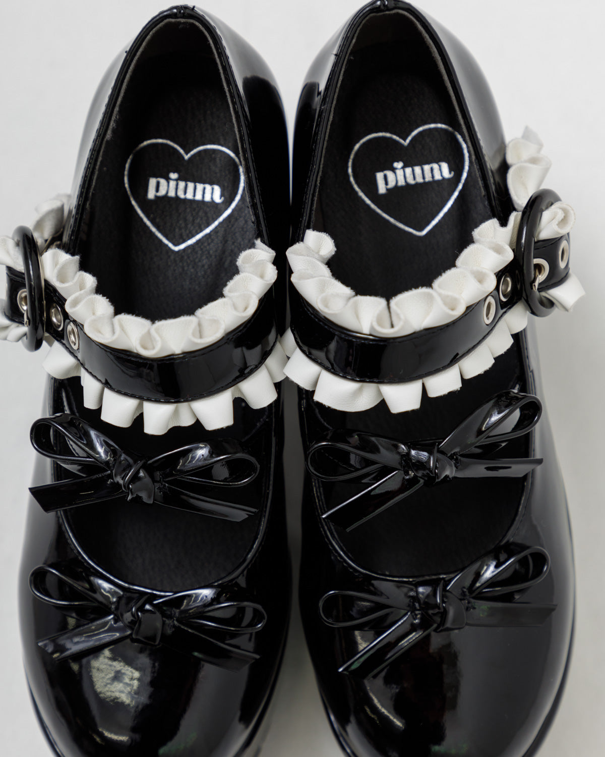 ダブルリボンエナメルパンプス