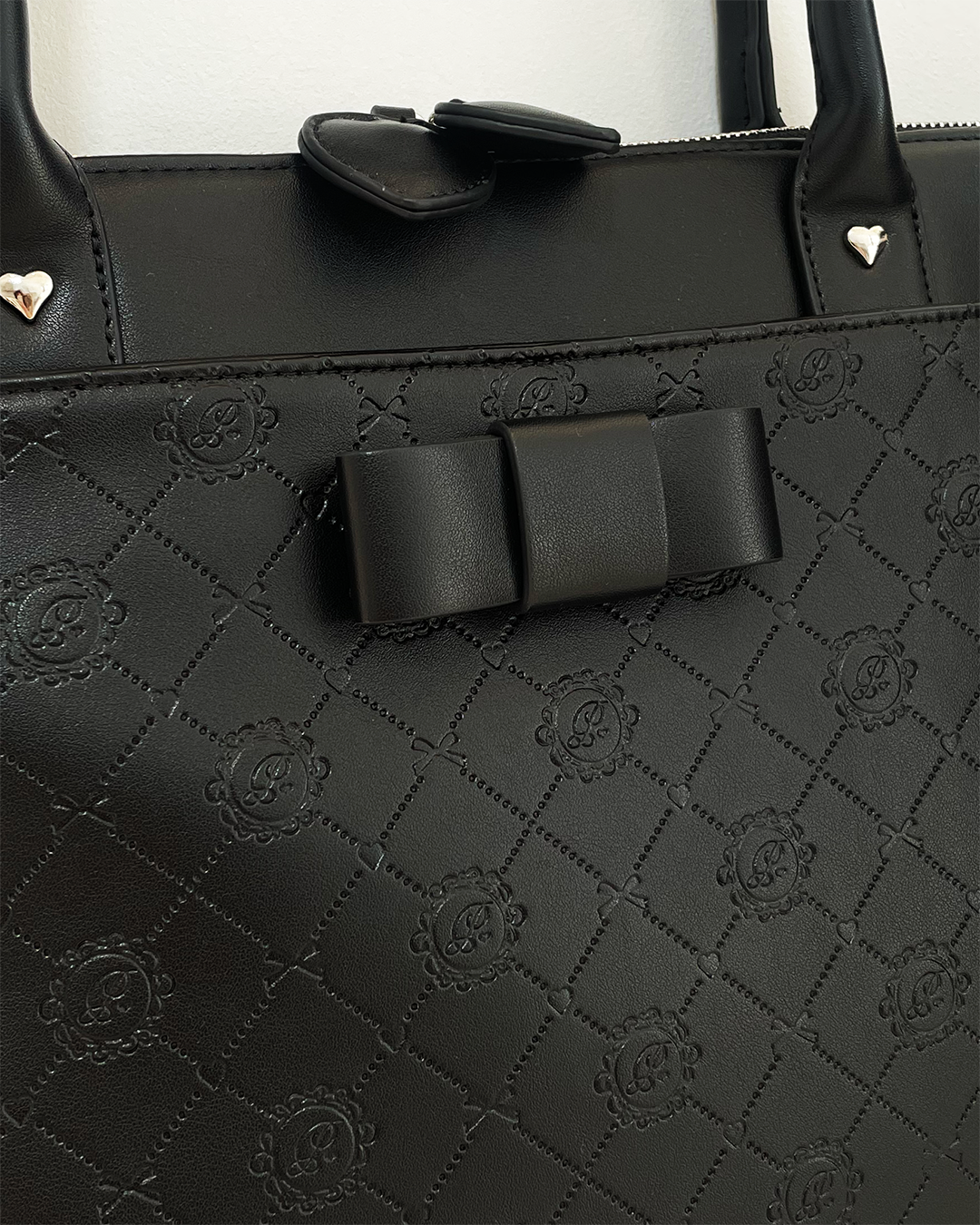 piumモノグラムPCバッグ