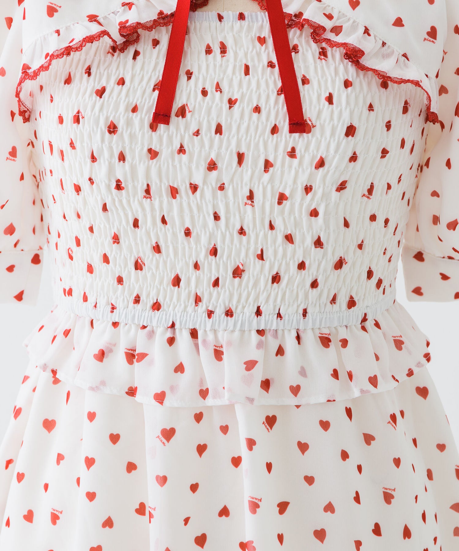 piumハートシャーリングケープワンピース