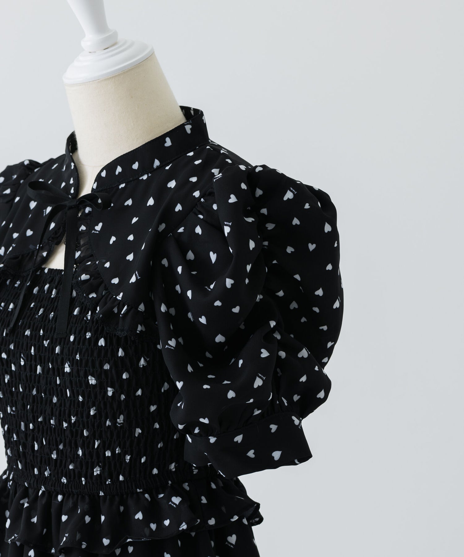 piumハートシャーリングケープワンピース