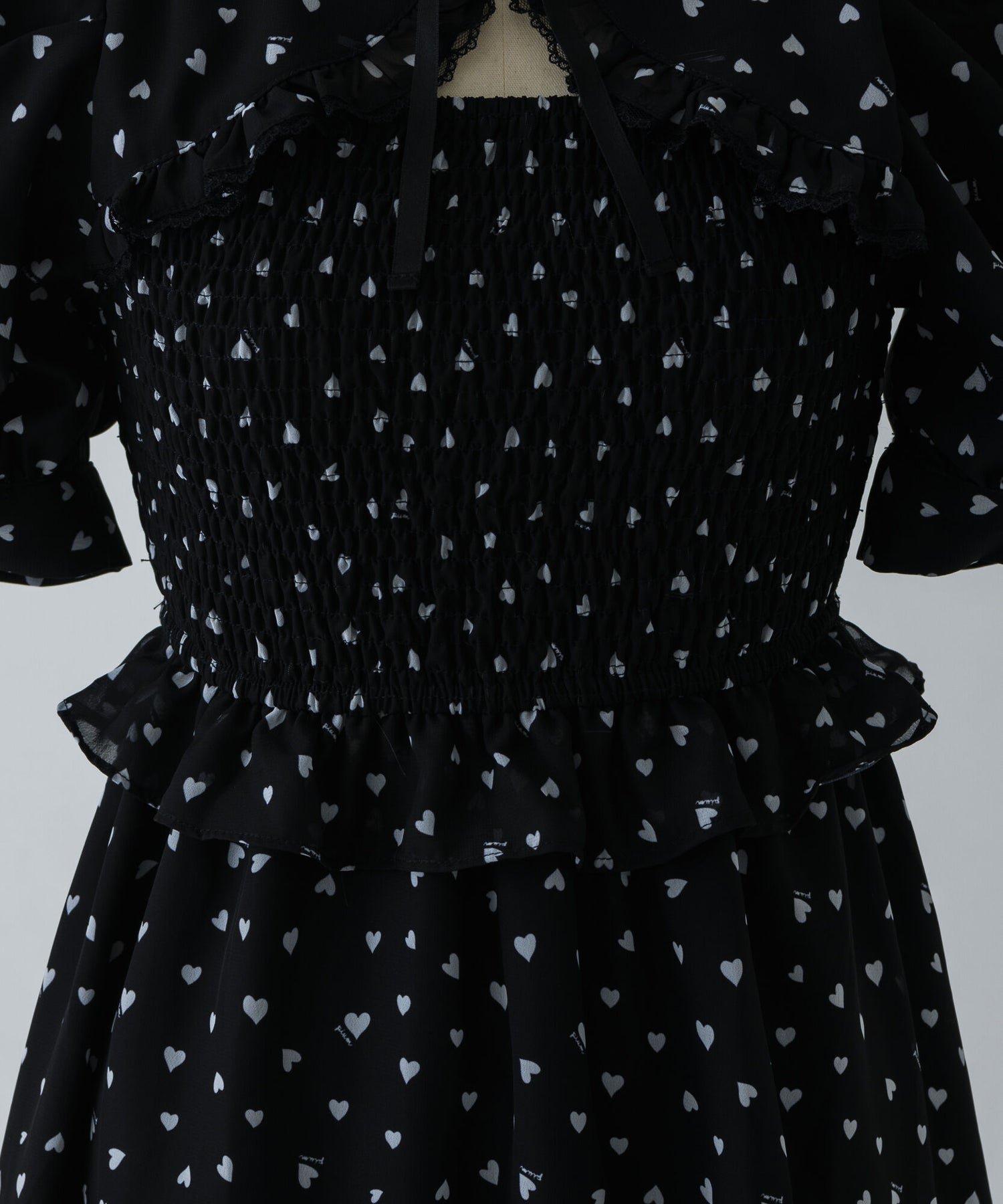 piumハートシャーリングケープワンピース